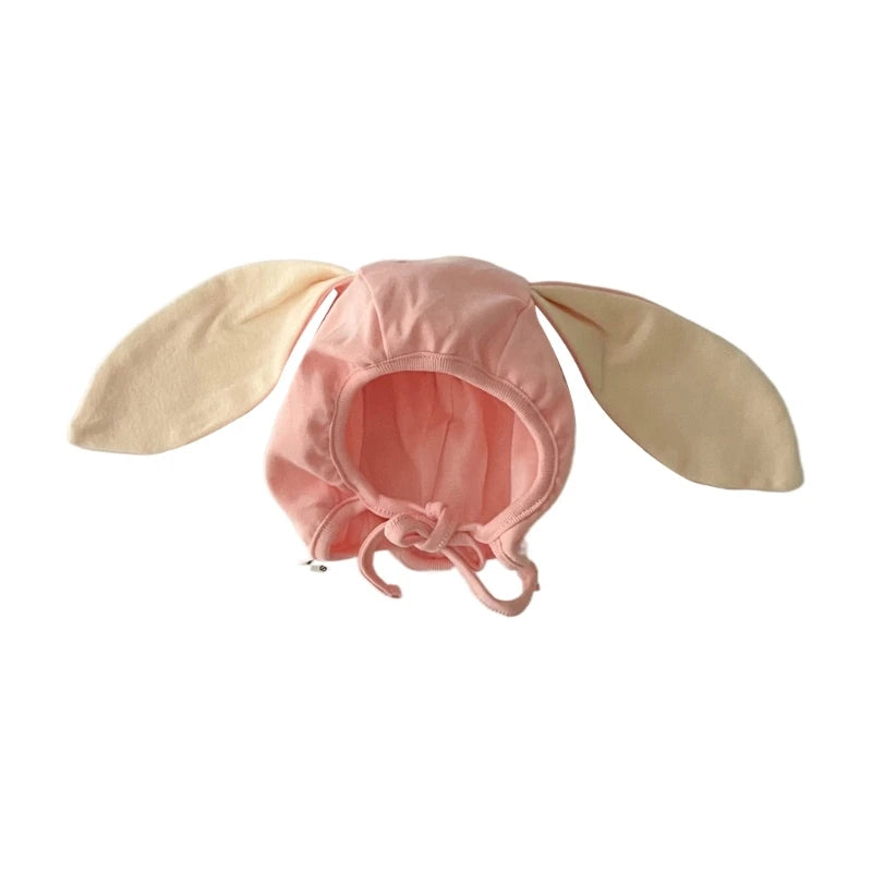 Bonnet bébé tricoté avec oreilles de lapin, chaud et mignon, idéal pour l'hiver.