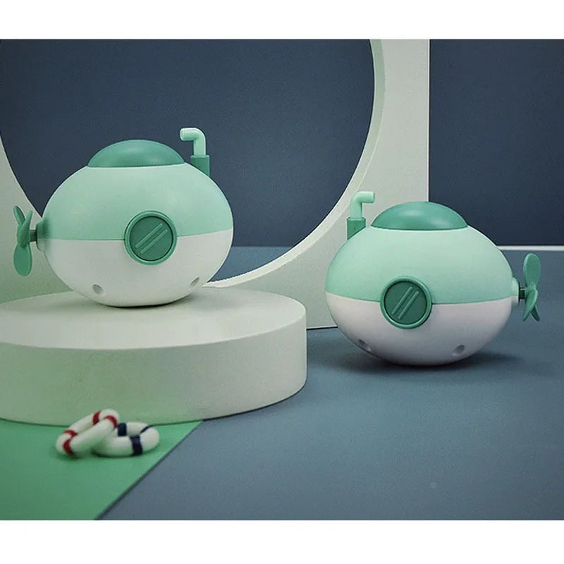 Baby takes a bath and plays in the water, Submarine, winding up animal chain, playing in the bathroom, children's toys