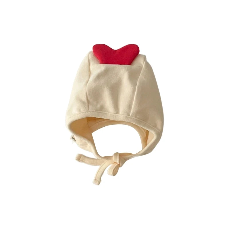 Bonnet bébé tricoté avec oreilles de lapin, chaud et mignon, idéal pour l'hiver.